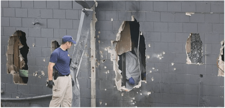 POLICE ARMORED VEHICLE CREATES HOLE IN CLUB WALL